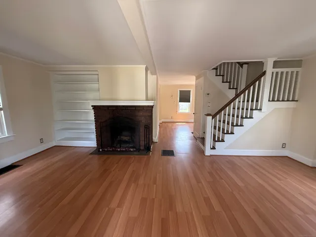 a living room with a fireplace