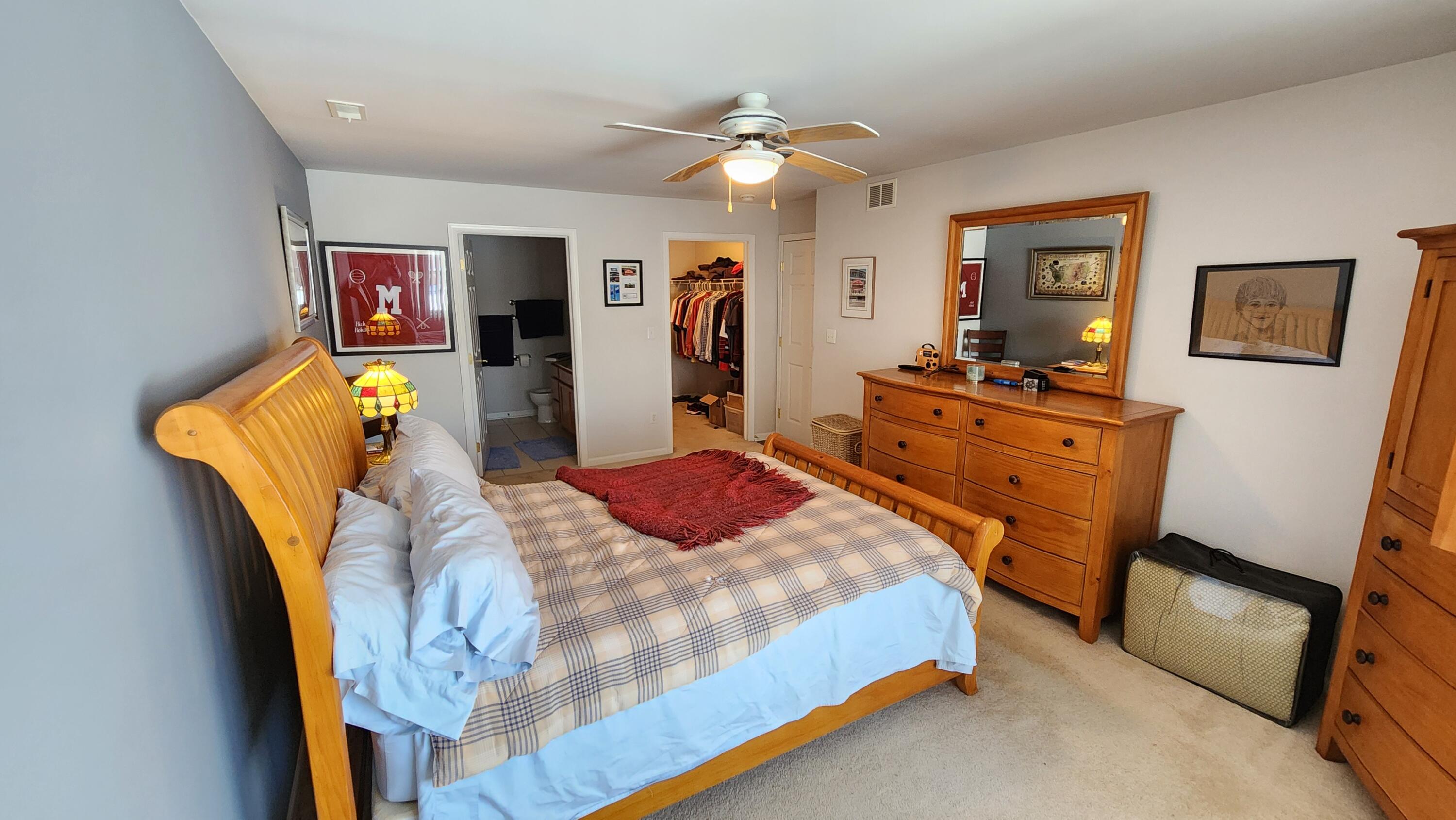 604 Cambridge Court, Unit 2A Munster, IN 46321 - Photo 15 of 31 a bedroom with a bed and wooden floor