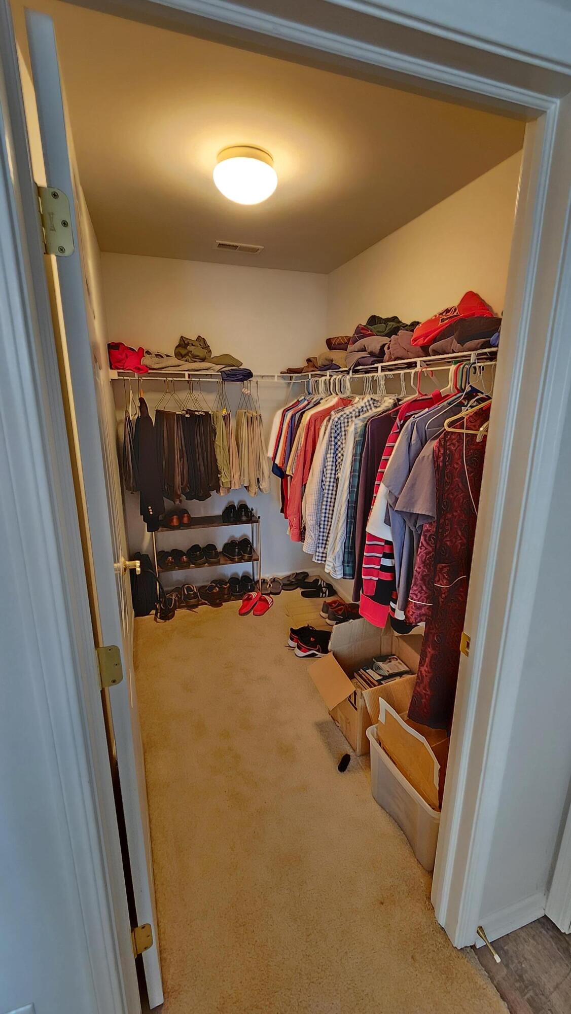 604 Cambridge Court, Unit 2A Munster, IN 46321 - Photo 16 of 31 a view of a room with air conditioner duct and materials on floor