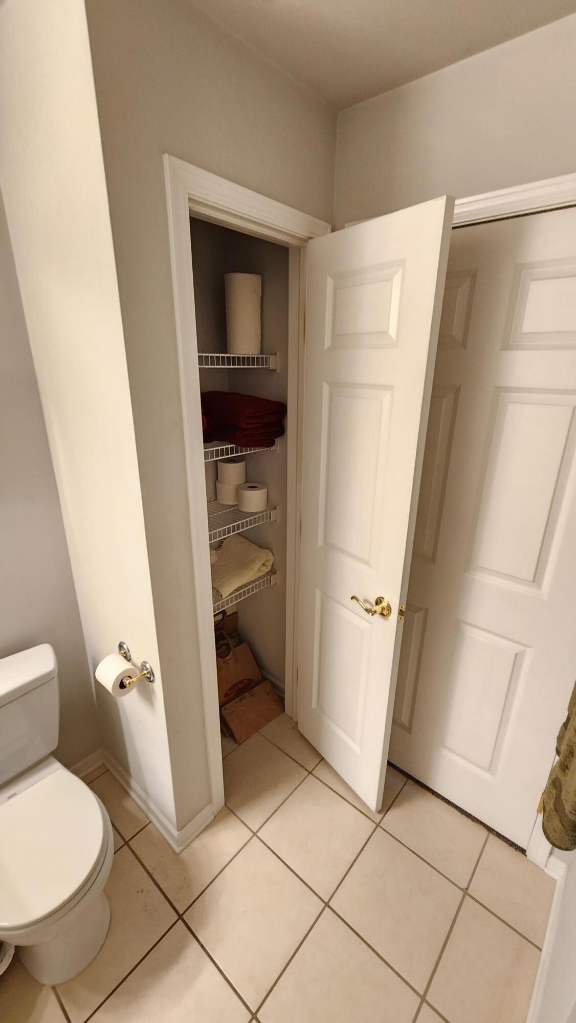 604 Cambridge Court, Unit 2A Munster, IN 46321 - Photo 23 of 31 a bathroom with a toilet and a sink