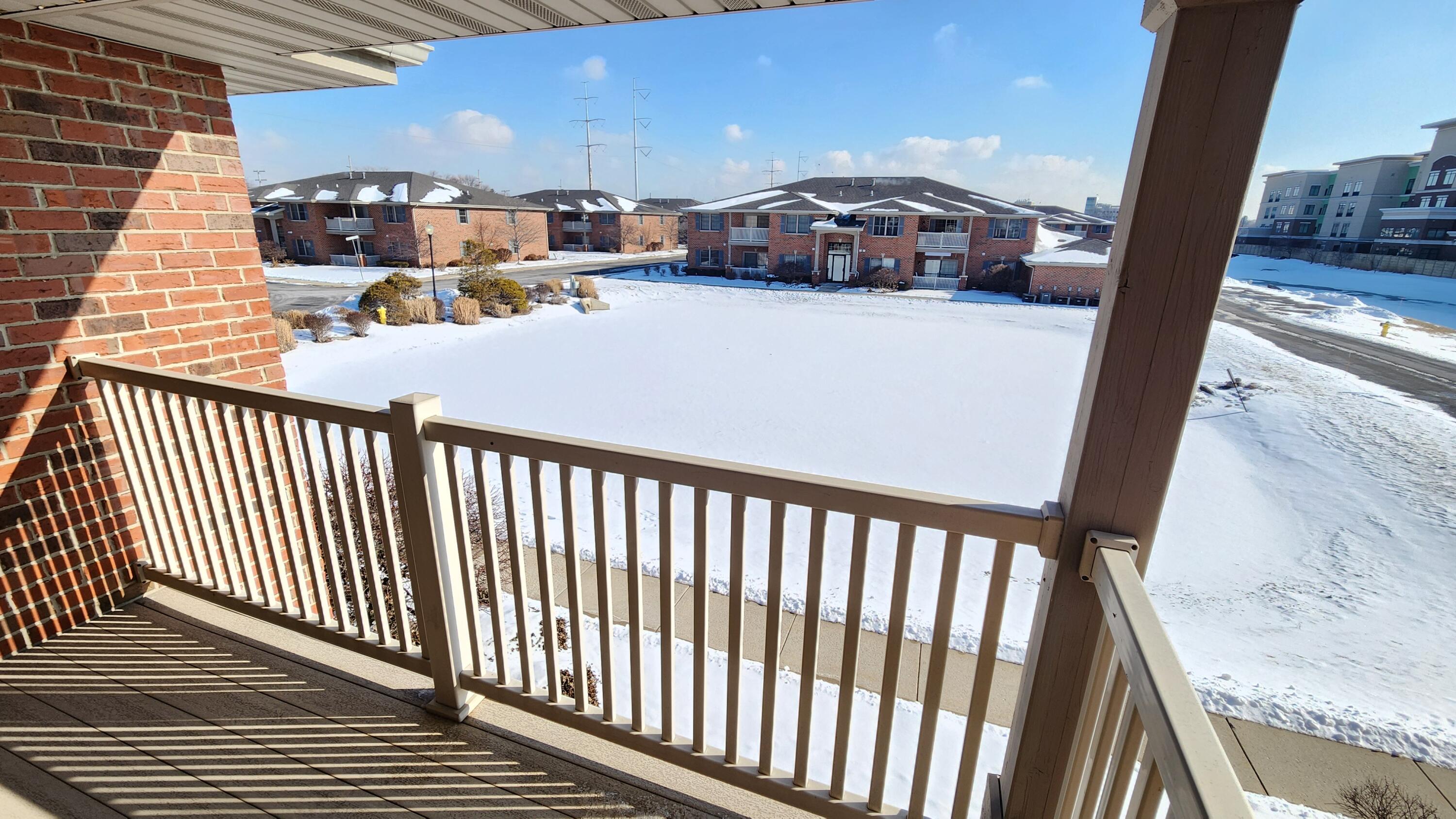 604 Cambridge Court, Unit 2A Munster, IN 46321 - Photo 29 of 31 a view of a balcony with car parked