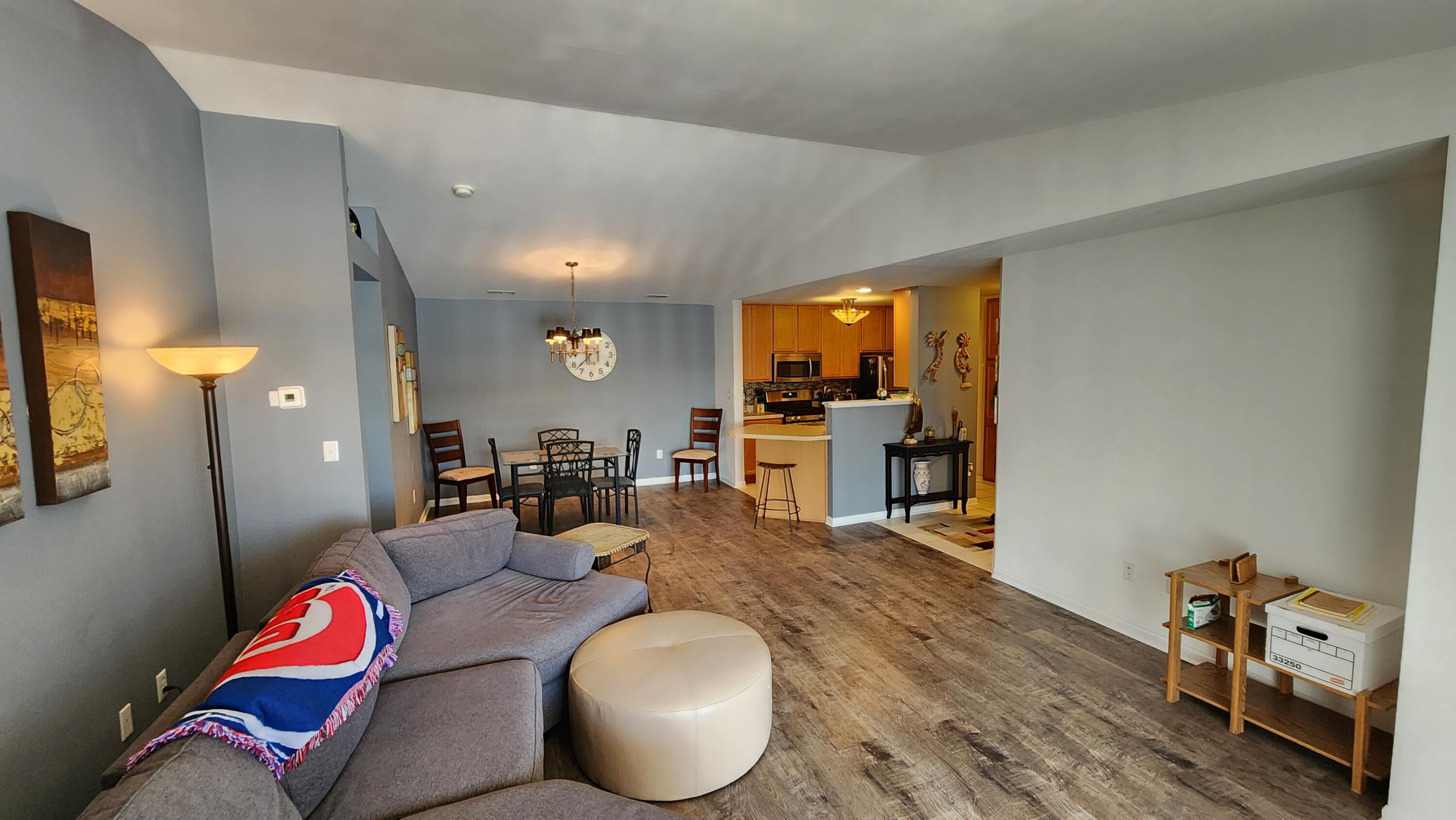 604 Cambridge Court, Unit 2A Munster, IN 46321 - Photo 5 of 31 a living room with furniture and wooden floor