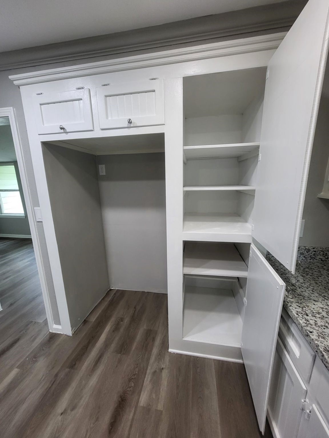 406 East Foley Street Alvin, TX 77511 - Photo 11 of 23 Deep pantry cabinets