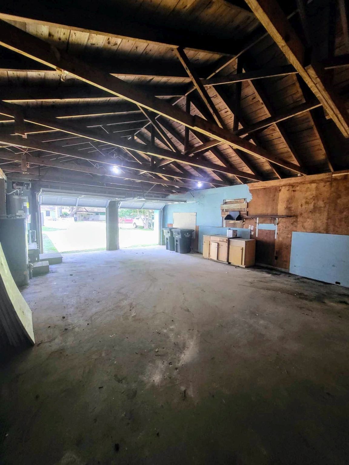 406 East Foley Street Alvin, TX 77511 - Photo 22 of 23 New water heater & washer/dryer hook-ups located in the garage