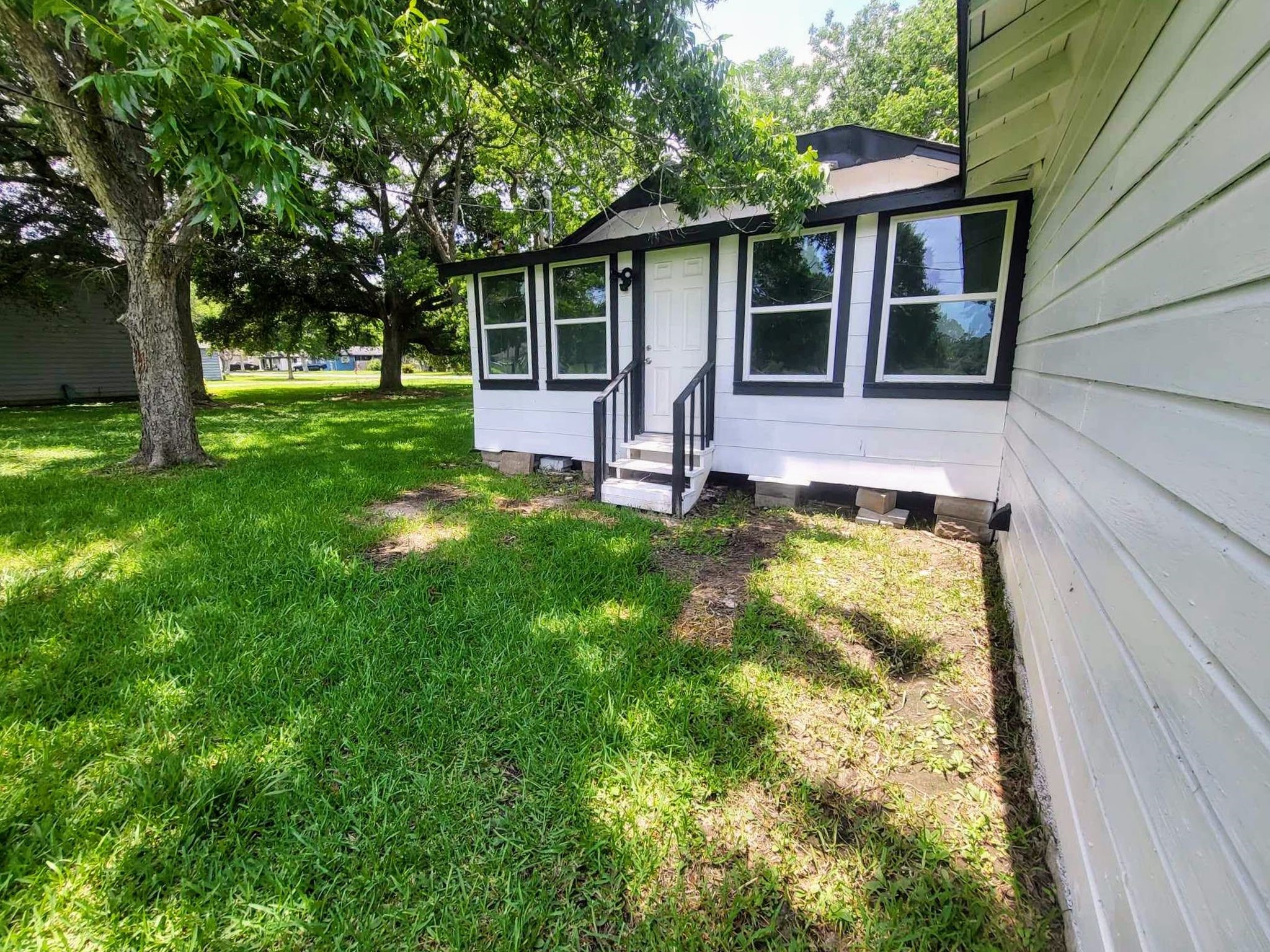 406 East Foley Street Alvin, TX 77511 - Photo 23 of 23 View from backdoor of garage to backdoor of home