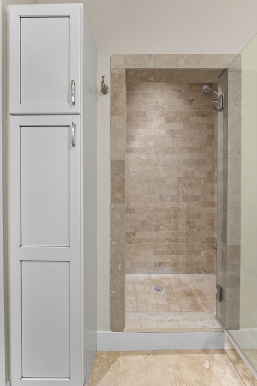 99-105 Broad Street, Unit 8B Boston, MA 02110 - Photo 23 of 37 a bathroom with a shower