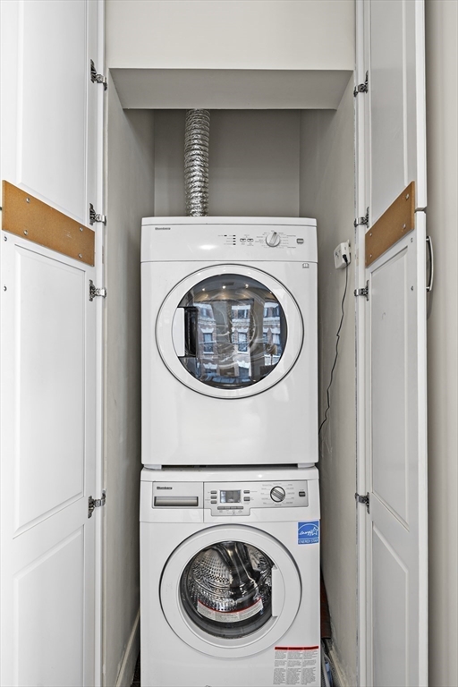 99-105 Broad Street, Unit 8B Boston, MA 02110 - Photo 24 of 37 a utility room with dryer and washer
