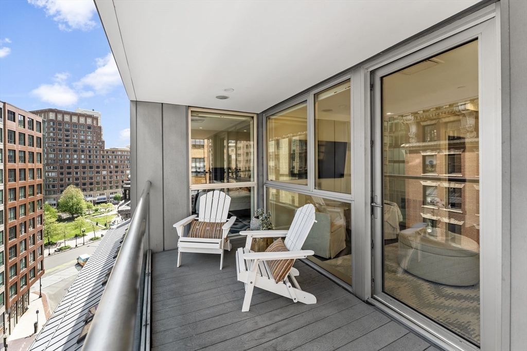 99-105 Broad Street, Unit 8B Boston, MA 02110 - Photo 27 of 37 a balcony with furniture and a potted plant