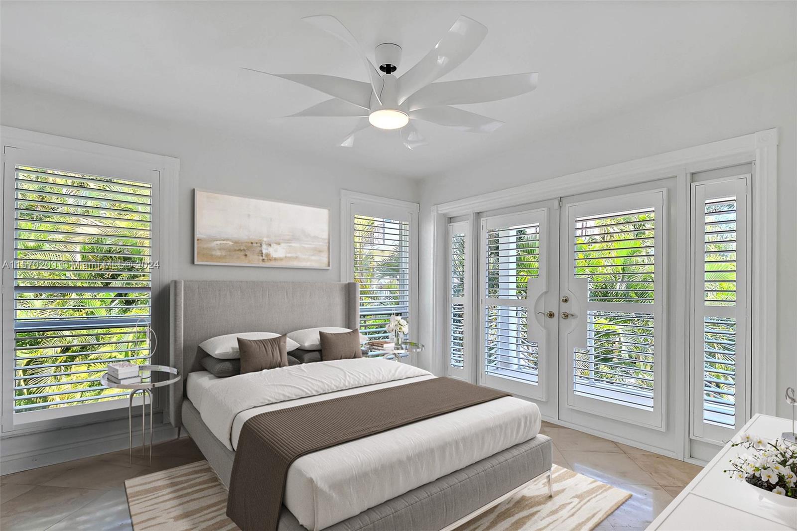 3620 Curtis Lane Miami, FL 33133 - Photo 13 of 33 a bedroom with a large bed and a window