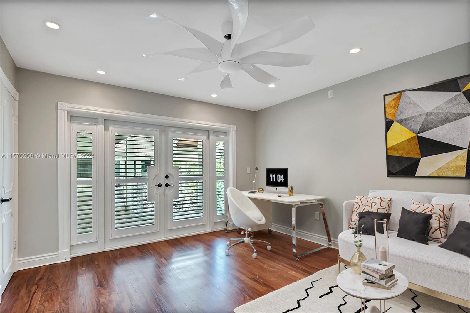 3620 Curtis Lane Miami, FL 33133 - Photo 15 of 33 a workspace with furniture hardwood and a window