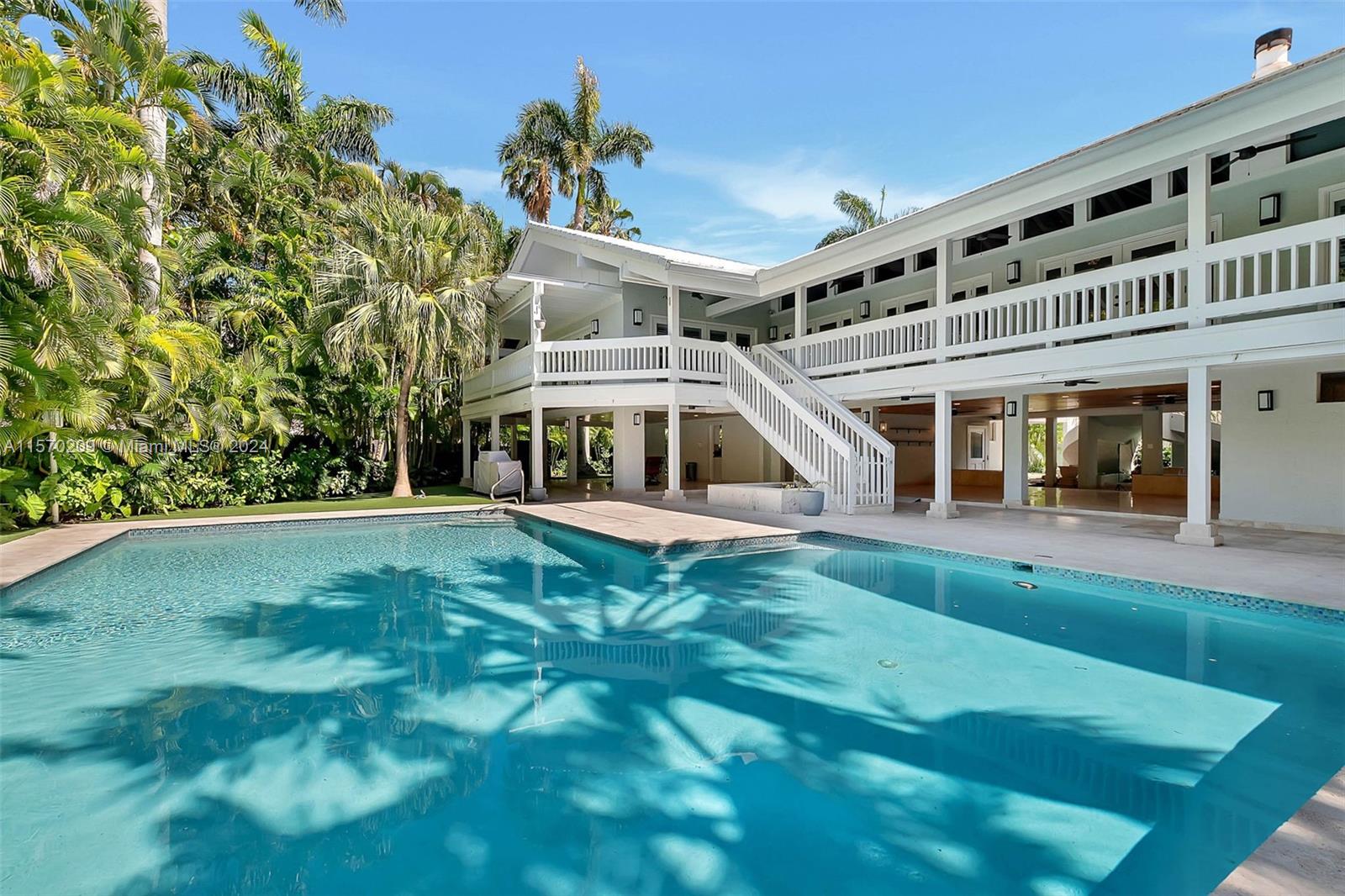 3620 Curtis Lane Miami, FL 33133 - Photo 16 of 33 a view of a house with a yard