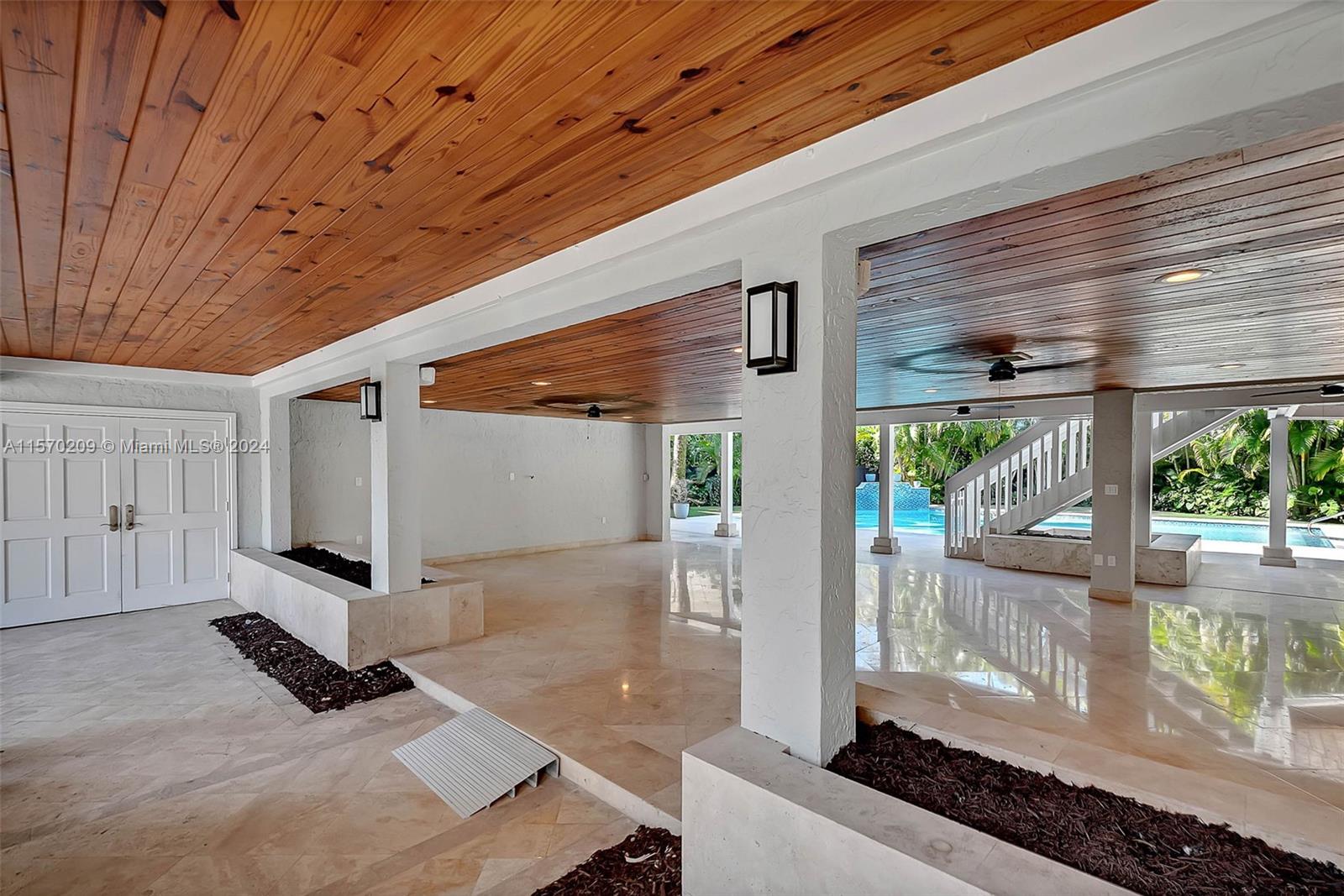 3620 Curtis Lane Miami, FL 33133 - Photo 20 of 33 a front view of a house with a large window