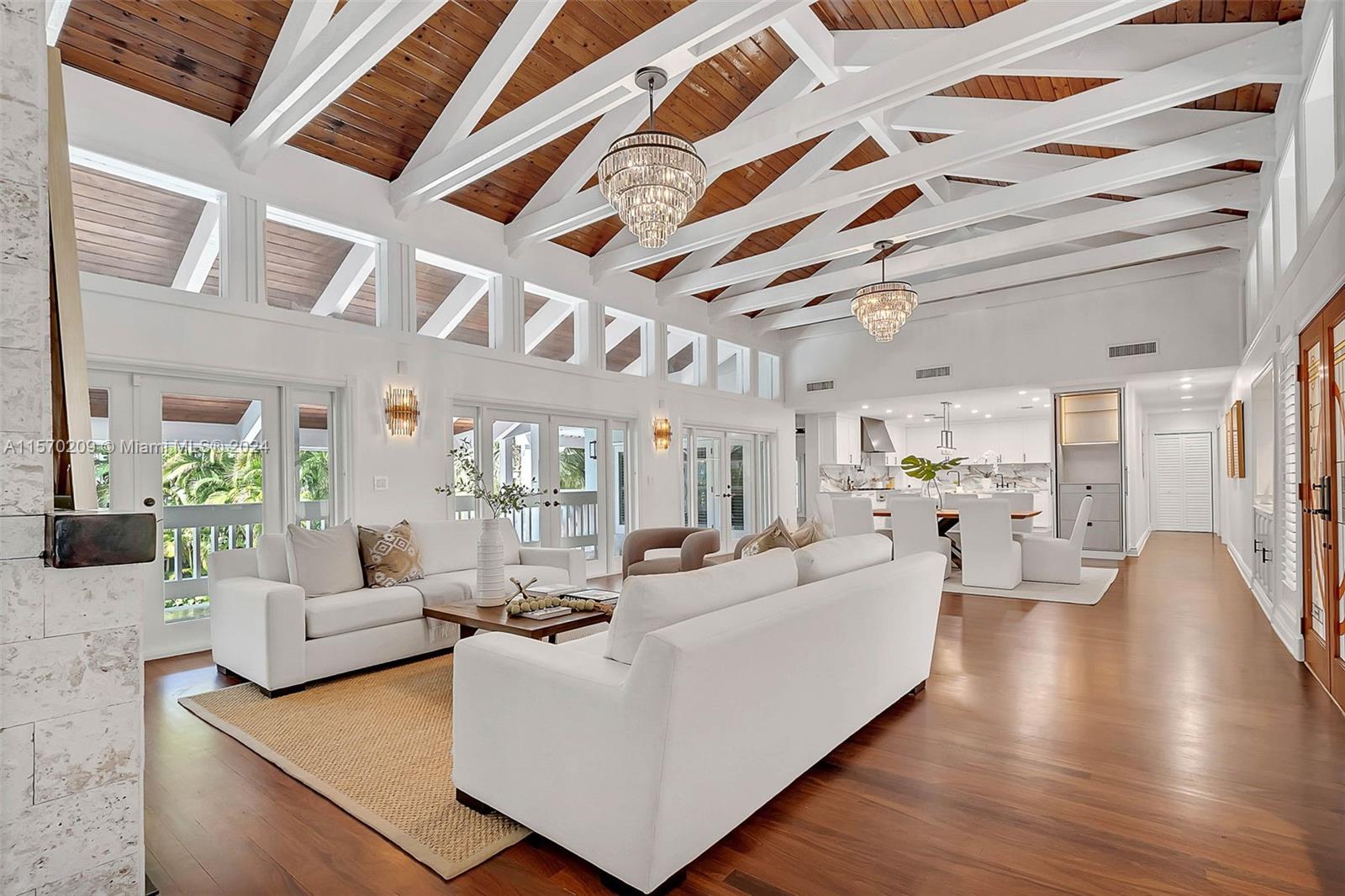 3620 Curtis Lane Miami, FL 33133 - Photo 2 of 33 a living room with furniture and a large window