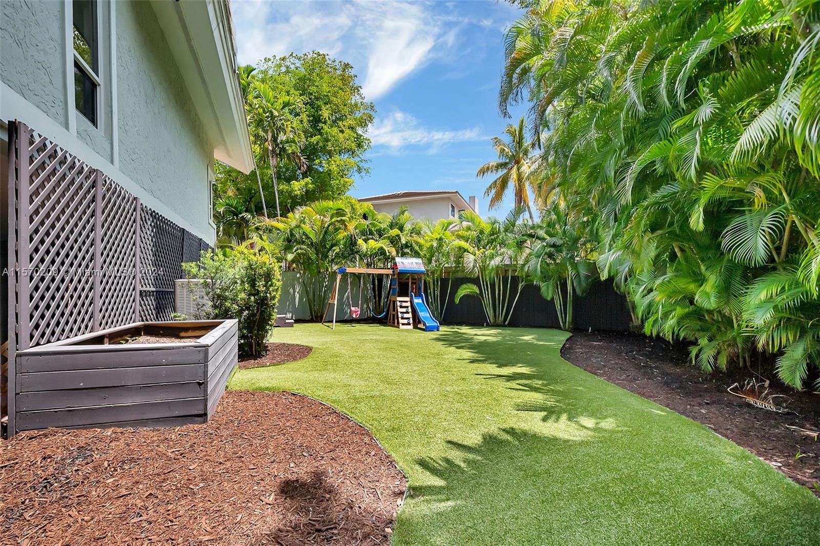 3620 Curtis Lane Miami, FL 33133 - Photo 22 of 33 a view of a backyard with couches plants
