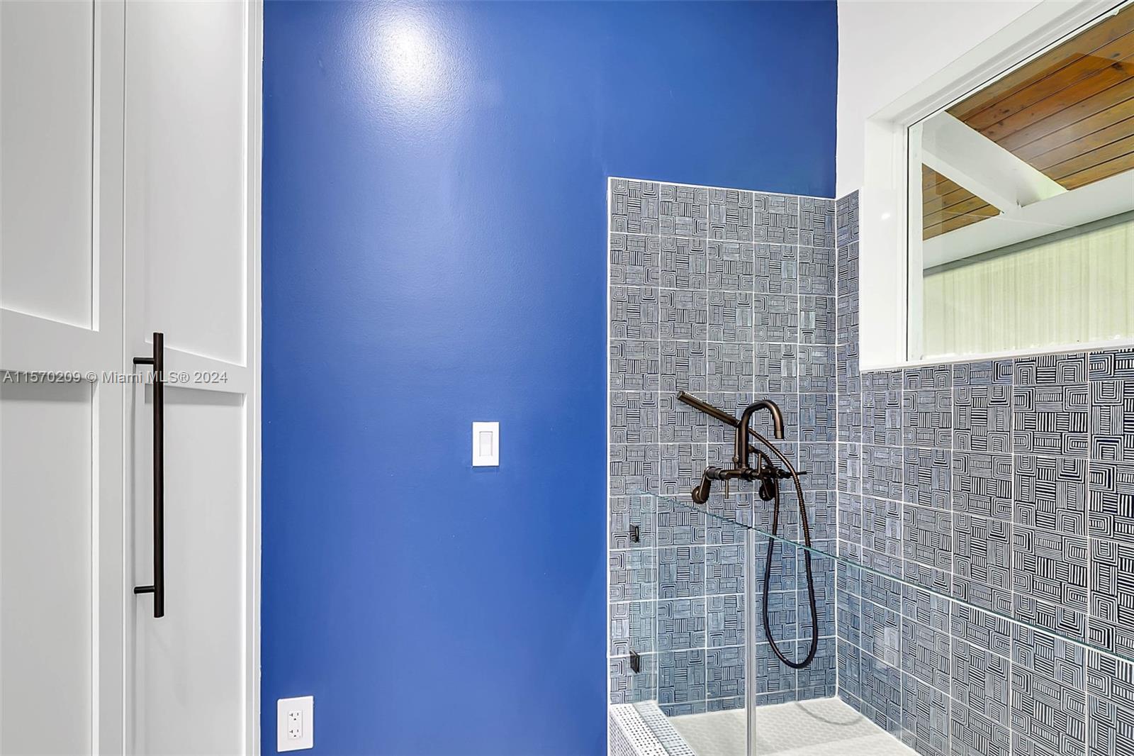 3620 Curtis Lane Miami, FL 33133 - Photo 25 of 33 a bathroom with a shower