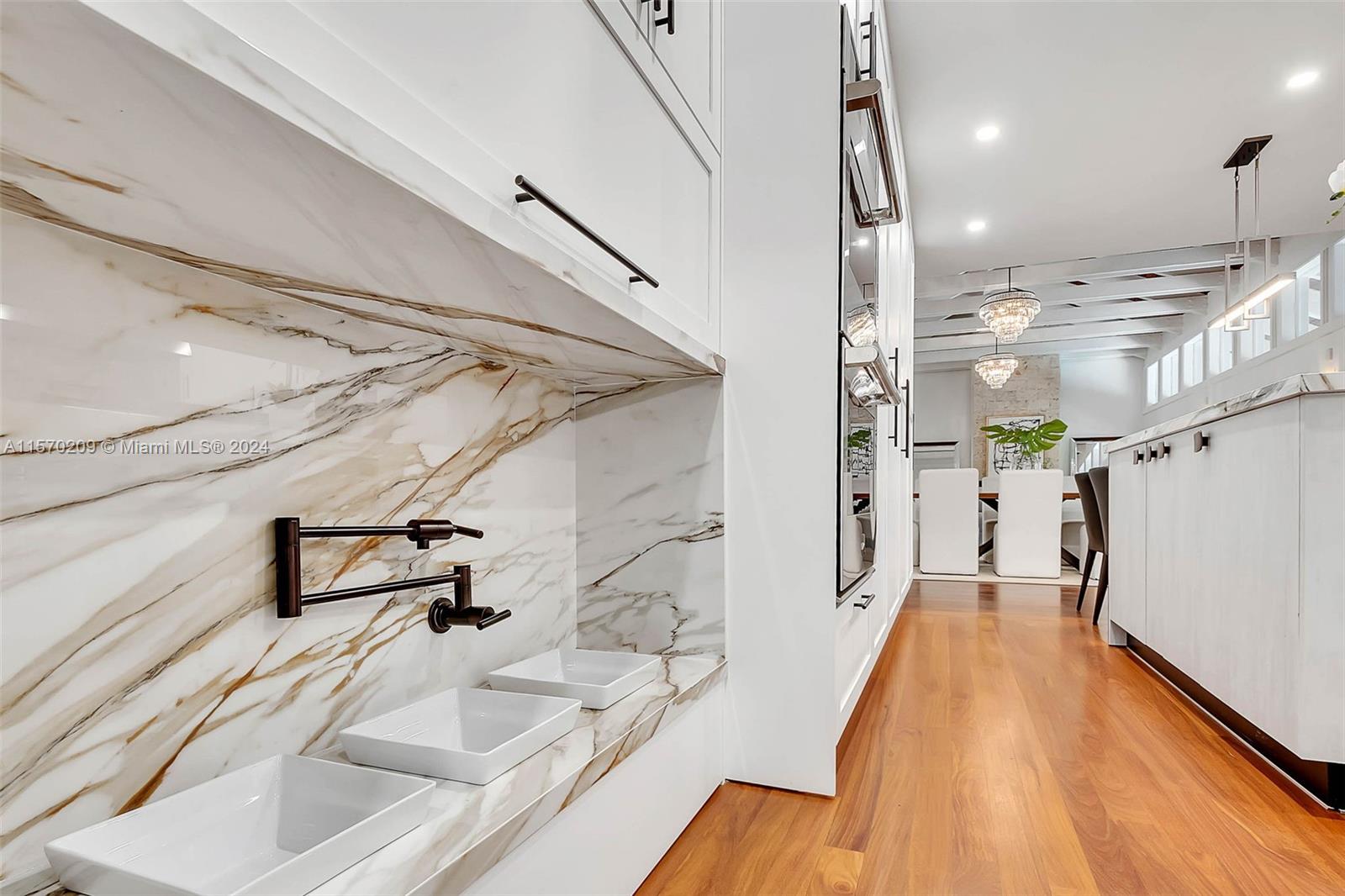 3620 Curtis Lane Miami, FL 33133 - Photo 26 of 33 a view of a patio with wooden floor and cabinets