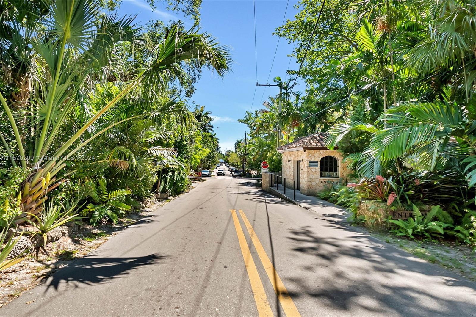 3620 Curtis Lane Miami, FL 33133 - Photo 32 of 33 a view of a house with a yard