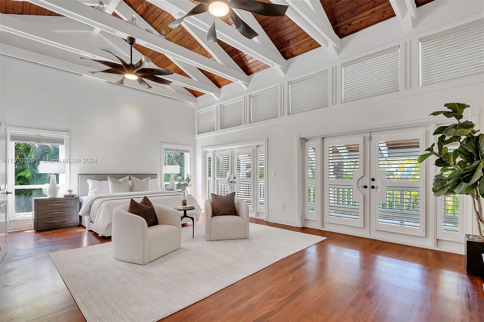 3620 Curtis Lane Miami, FL 33133 - Photo 8 of 33 a living room with furniture and wooden floor