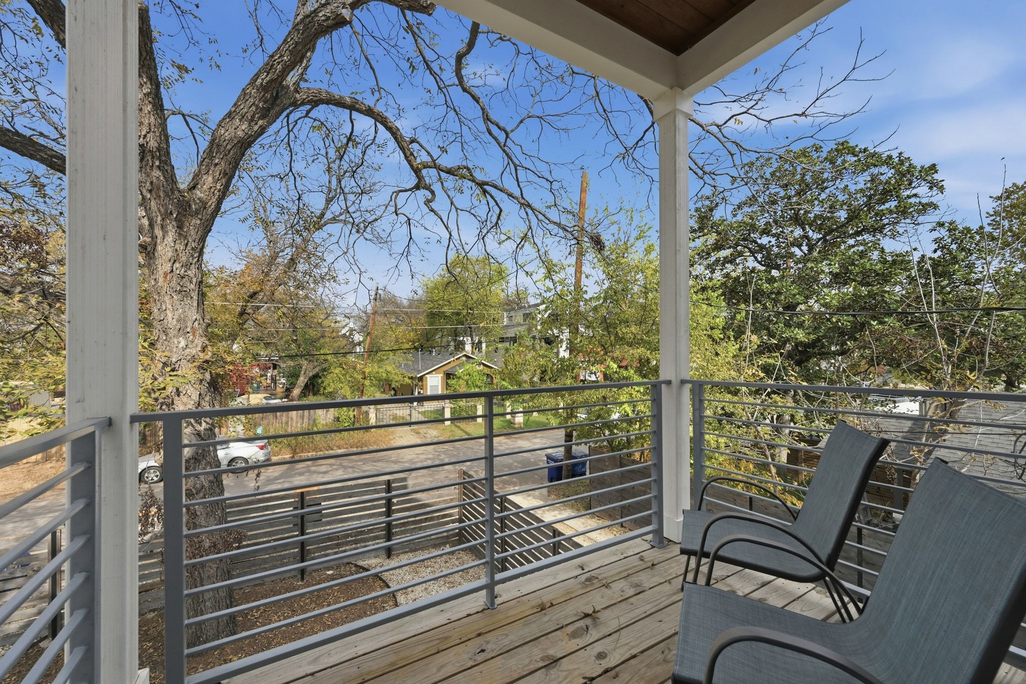 2811 Garwood Street, Unit A Austin, TX 78702 - Photo 3 of 27 a view of a balcony with chairs