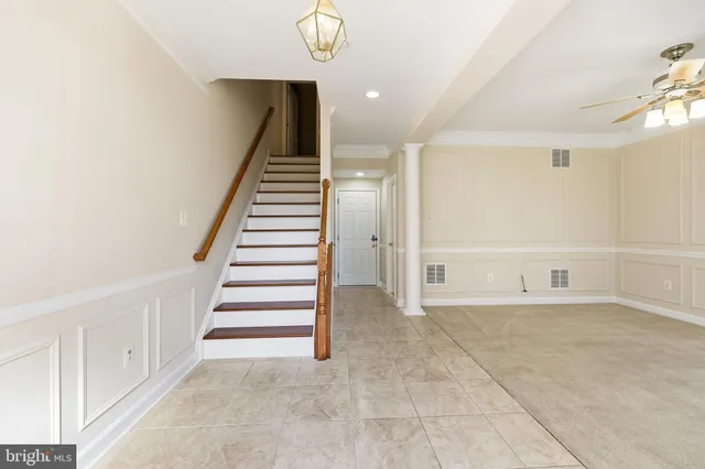 a view of an entryway with stairs