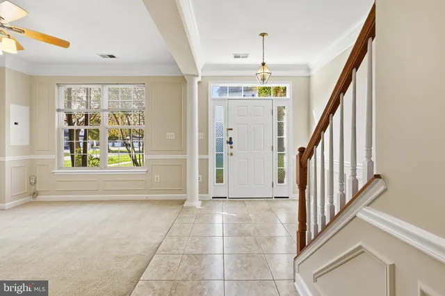 a view of entryway with hardwood and door