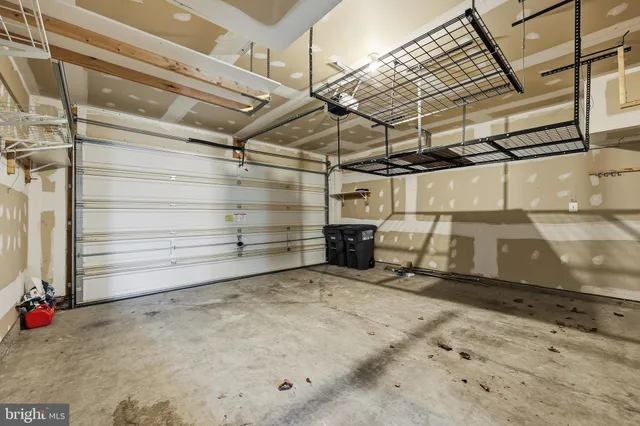 a front view of a house with a garage