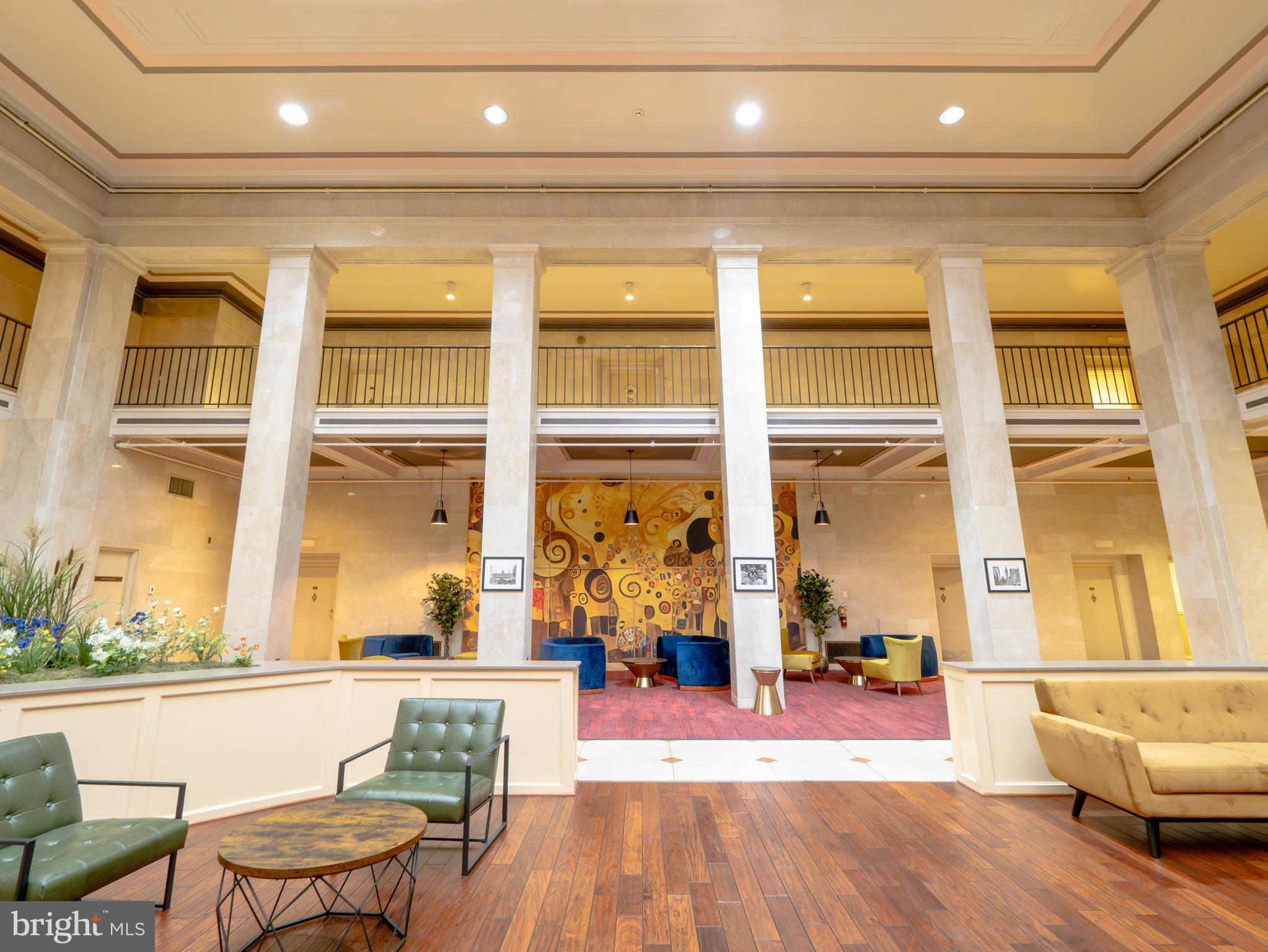 1601 Spring Garden Street, Unit 208 Philadelphia, PA 19130 - Photo 18 of 19 a living room with furniture and a large window