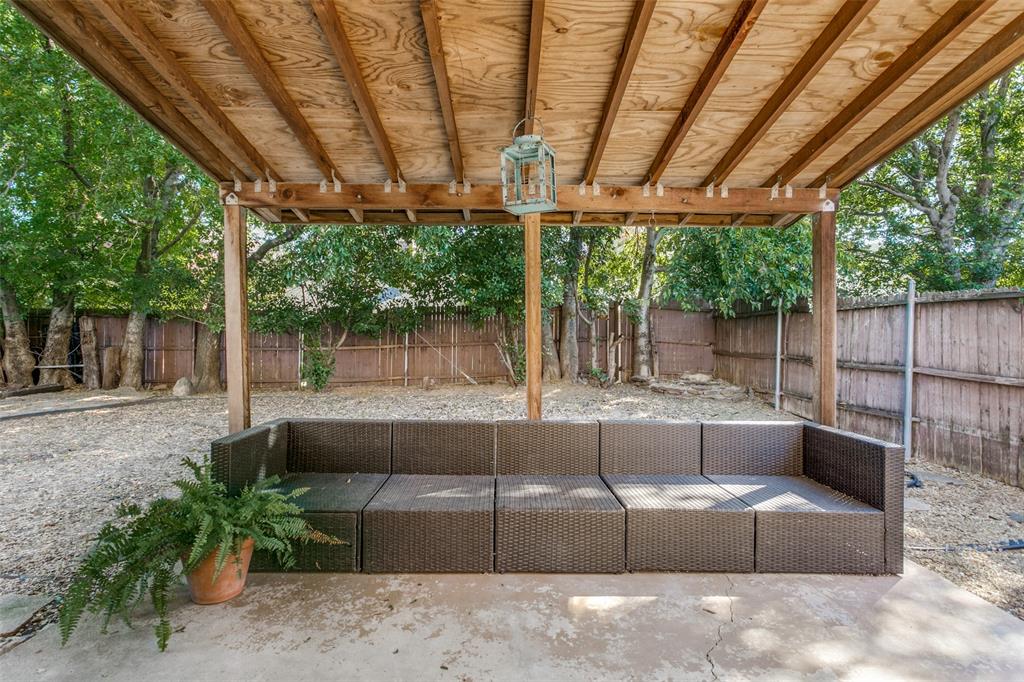 2133 Rim Rock Drive Keller, TX 76248 - Photo 32 of 37 Fenced backyard with outdoor lounge area