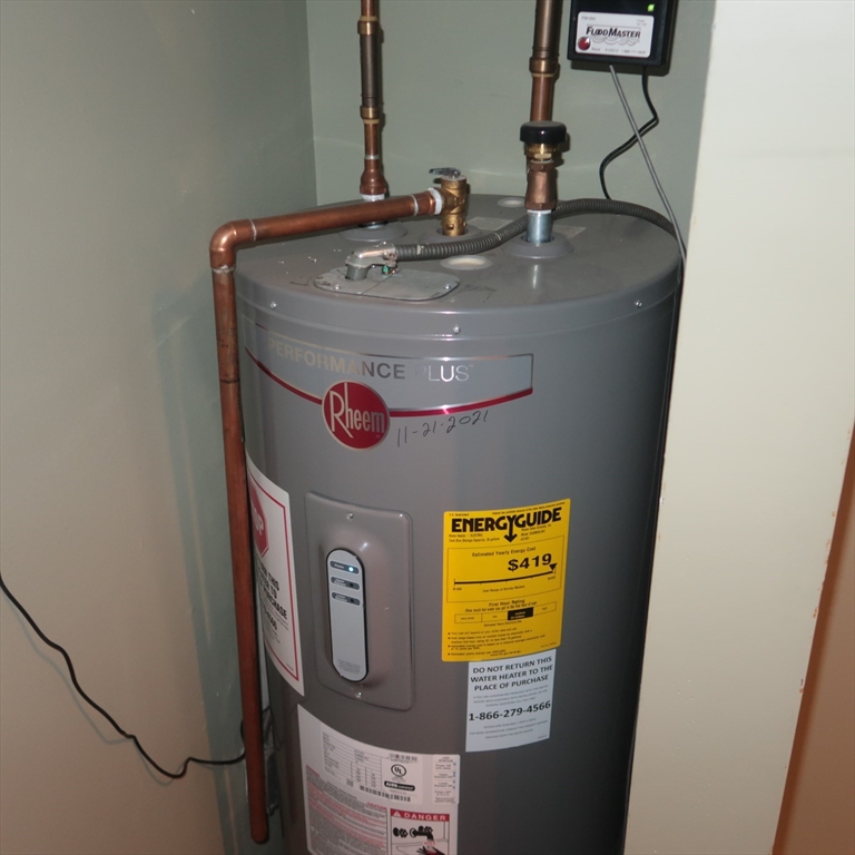 1 Atkinson Drive, Unit 3 Saugus, MA 01906 - Photo 17 of 27 a bathroom with a sink and a mirror