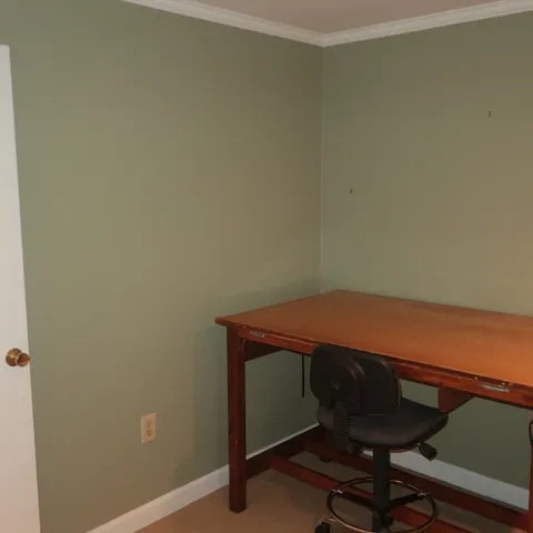 a room with a table and chair