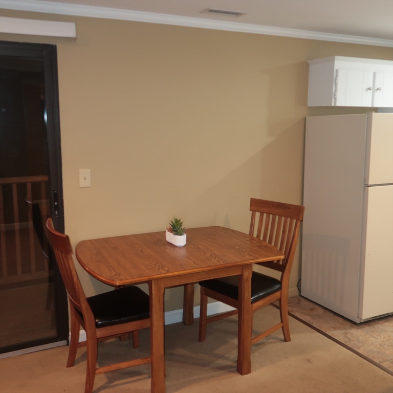 1 Atkinson Drive, Unit 3 Saugus, MA 01906 - Photo 8 of 27 a view of a dining room with furniture