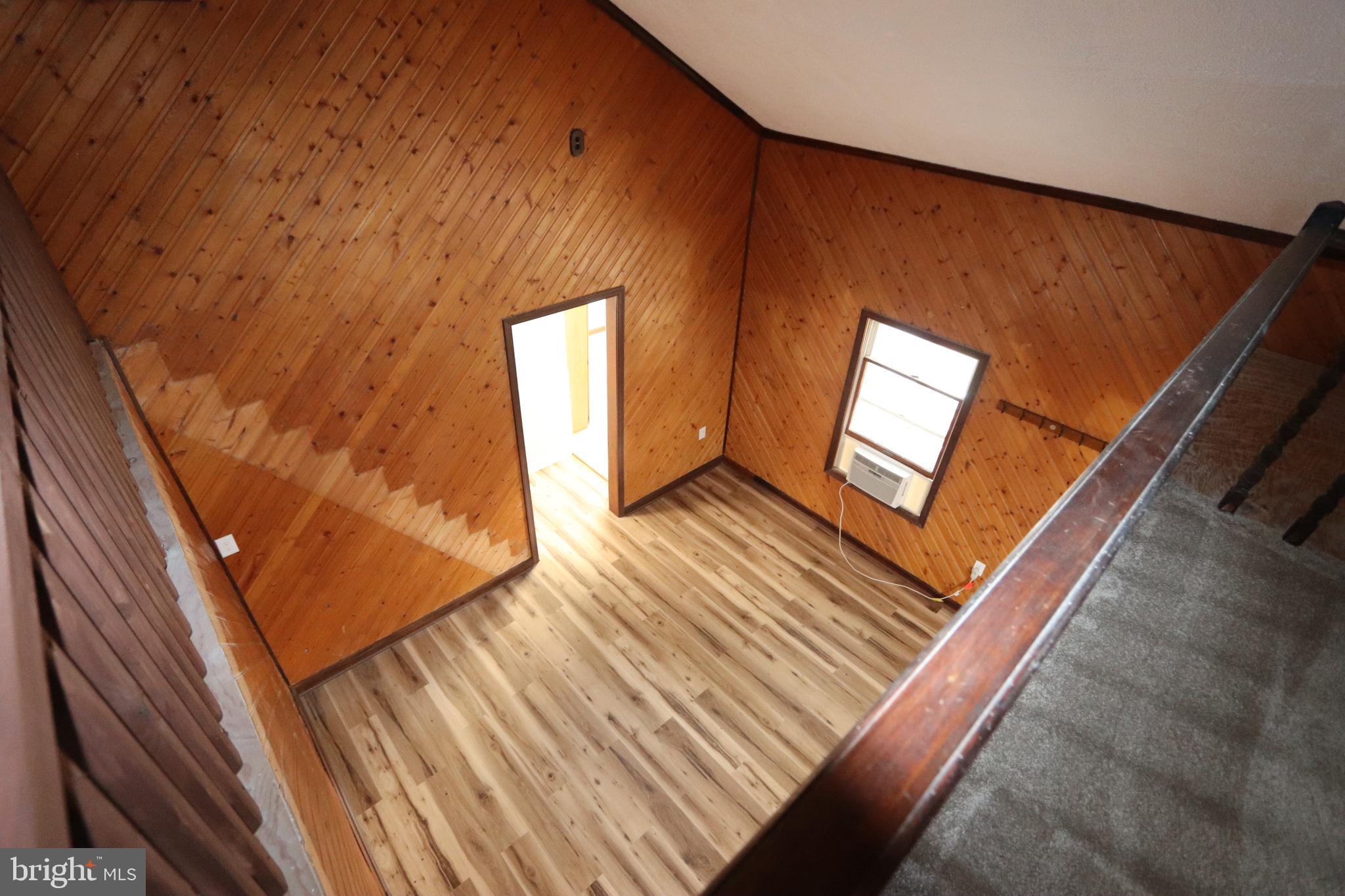 9540 Greenfield Road La Plata, MD 20646 - Photo 23 of 33 a view of an empty room and wooden floor