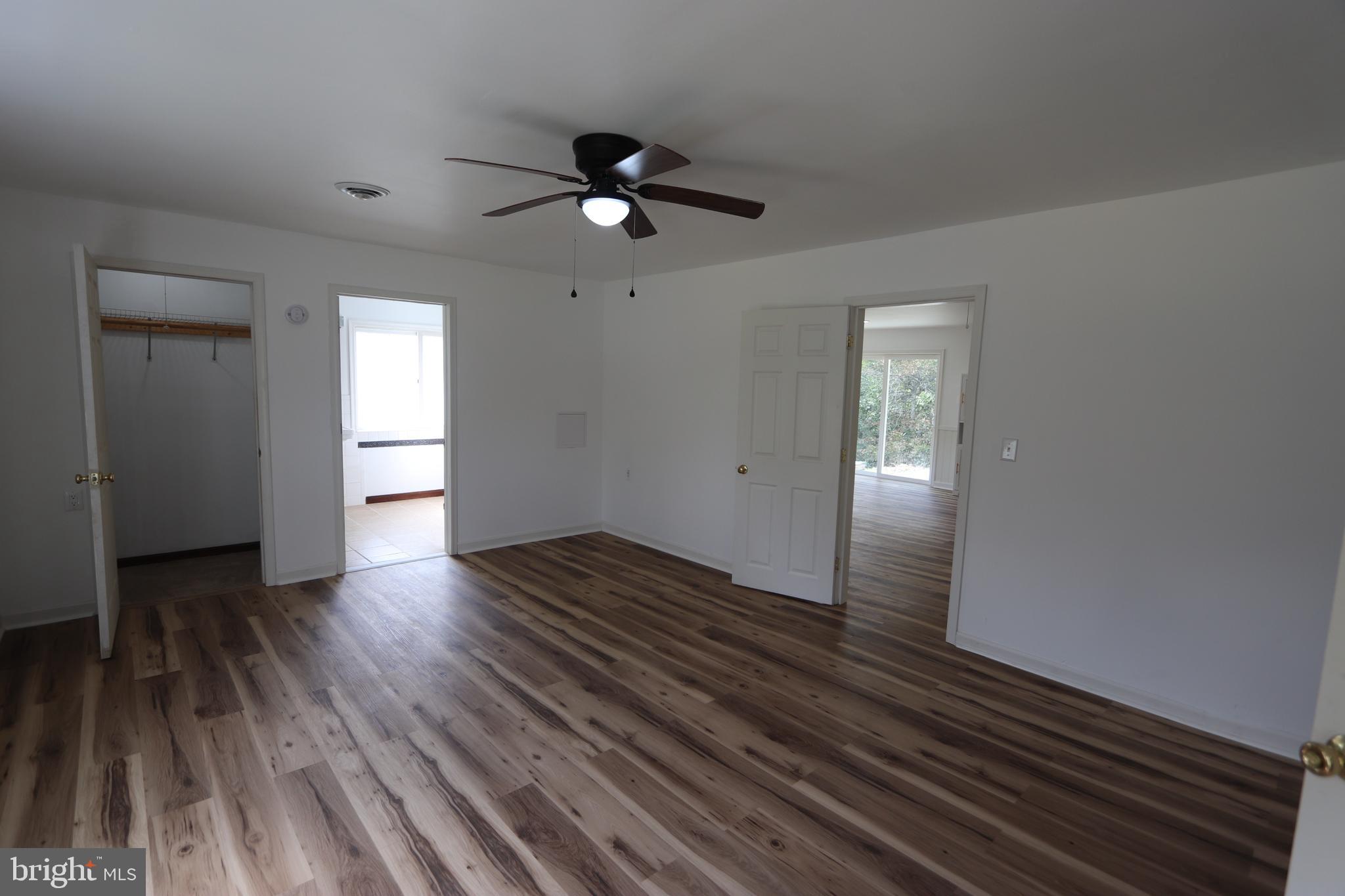 9540 Greenfield Road La Plata, MD 20646 - Photo 8 of 33 wooden floor in an empty room with a window