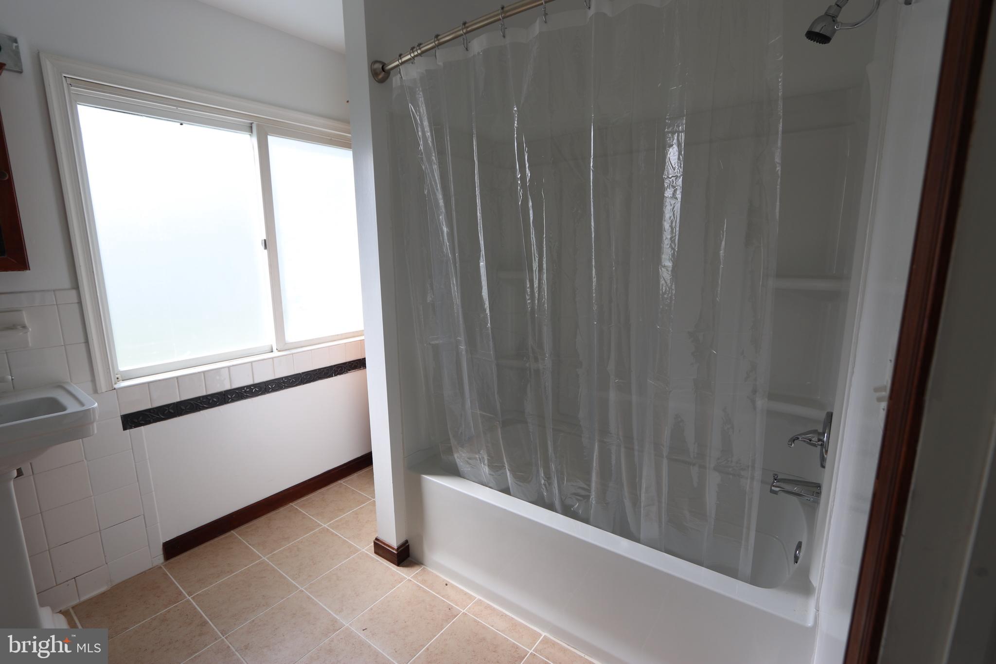 9540 Greenfield Road La Plata, MD 20646 - Photo 9 of 33 a view of a bathroom with a shower