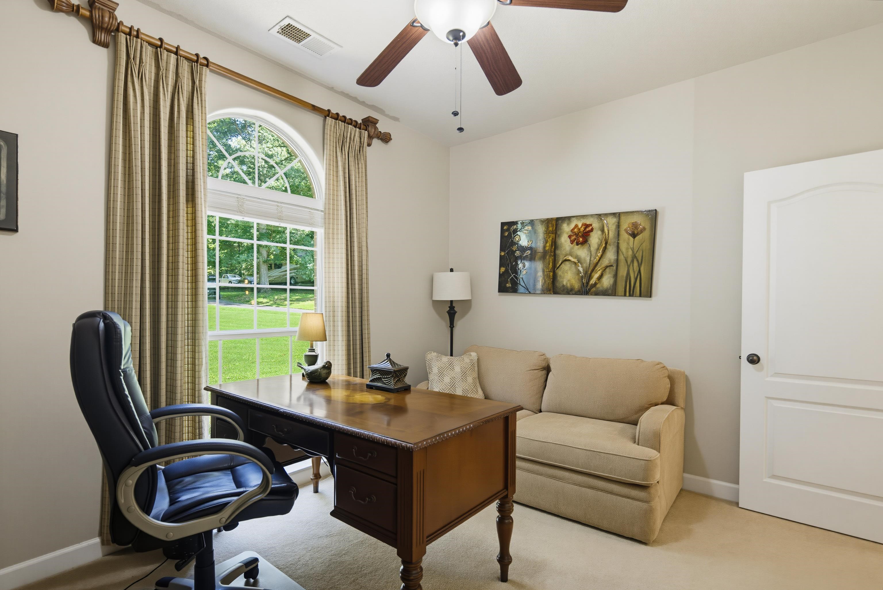243 Hayes Road Munford, TN 38058 - Photo 25 of 25 Split floor plan bedroom located off main living area with view of wooded front of the property.