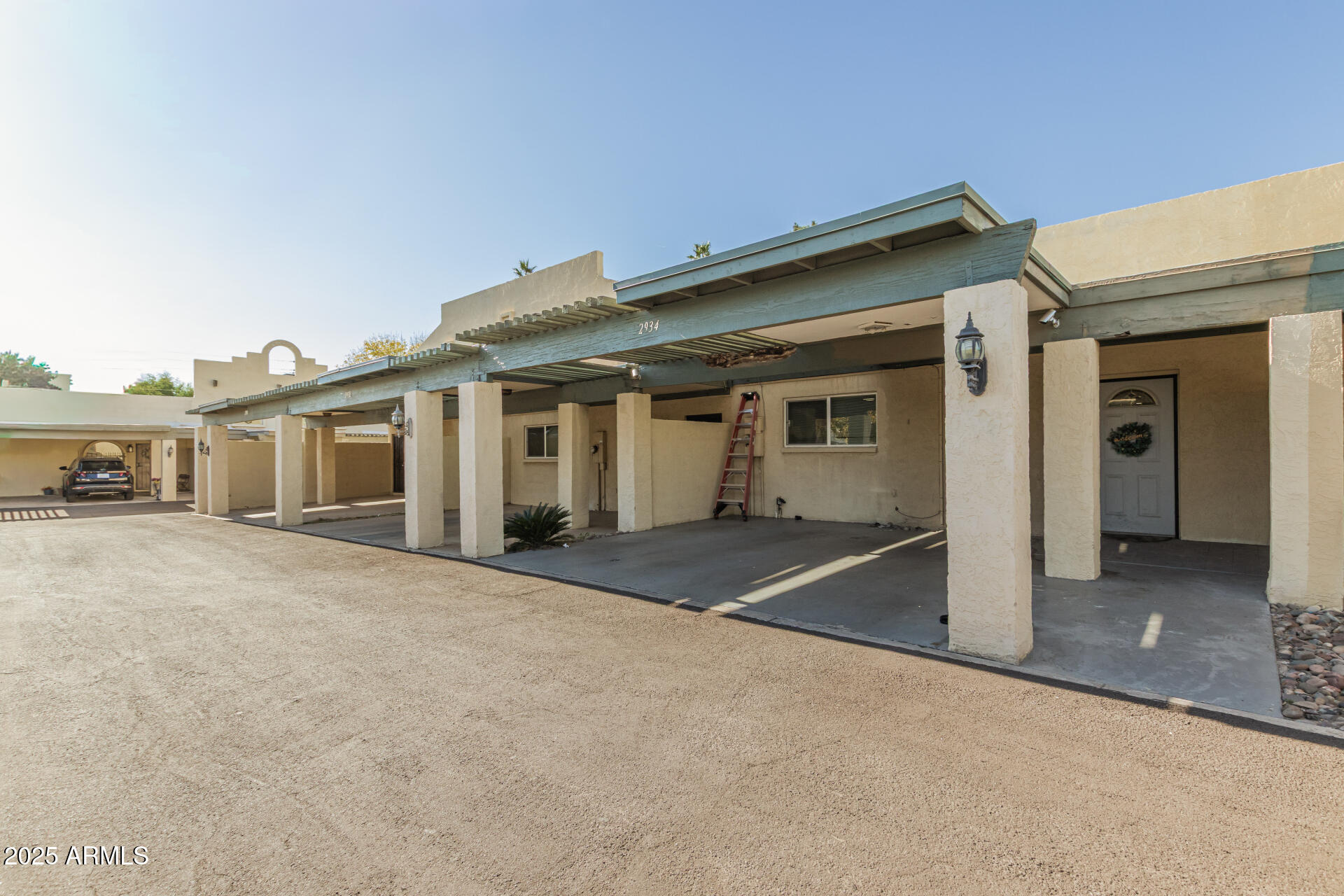 2934 North 22nd Place Phoenix, AZ 85016 - Photo 2 of 27 a view of a house with a flat screen tv and outdoor space