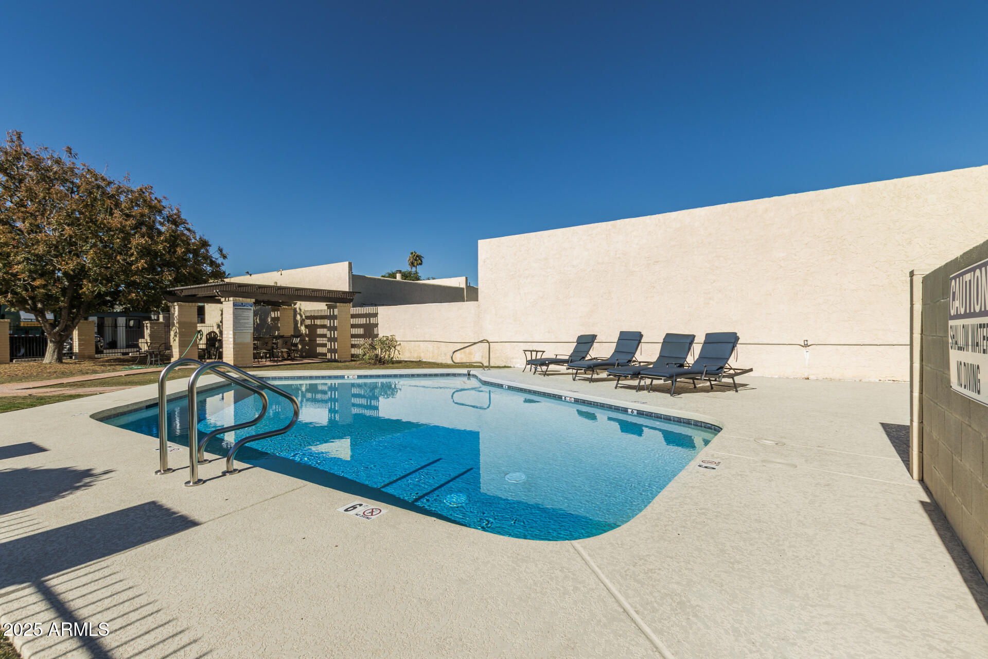 2934 North 22nd Place Phoenix, AZ 85016 - Photo 26 of 27 a view of a swimming pool with a terrace