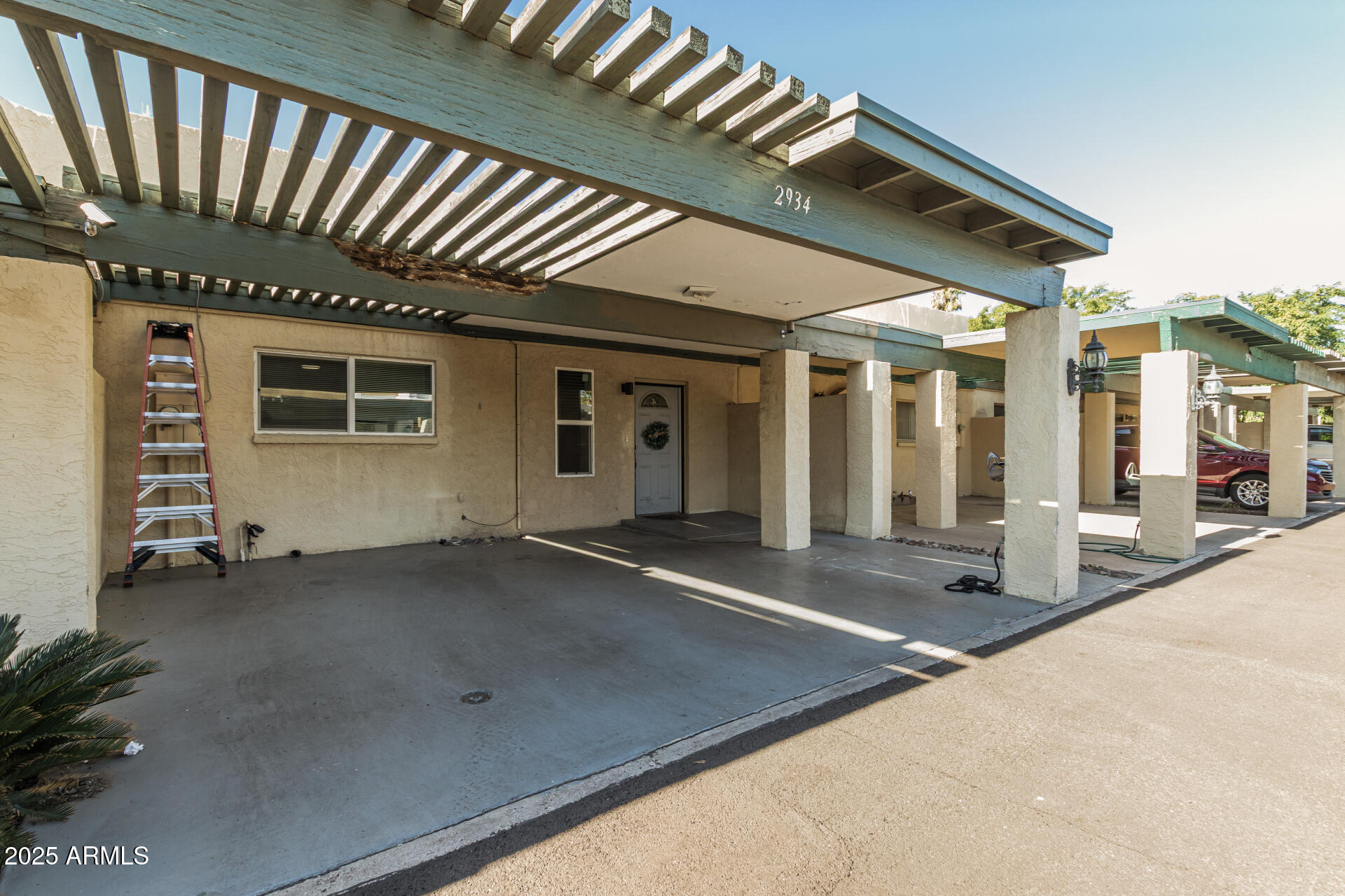 2934 North 22nd Place Phoenix, AZ 85016 - Photo 3 of 27 a front view of a house with a garage