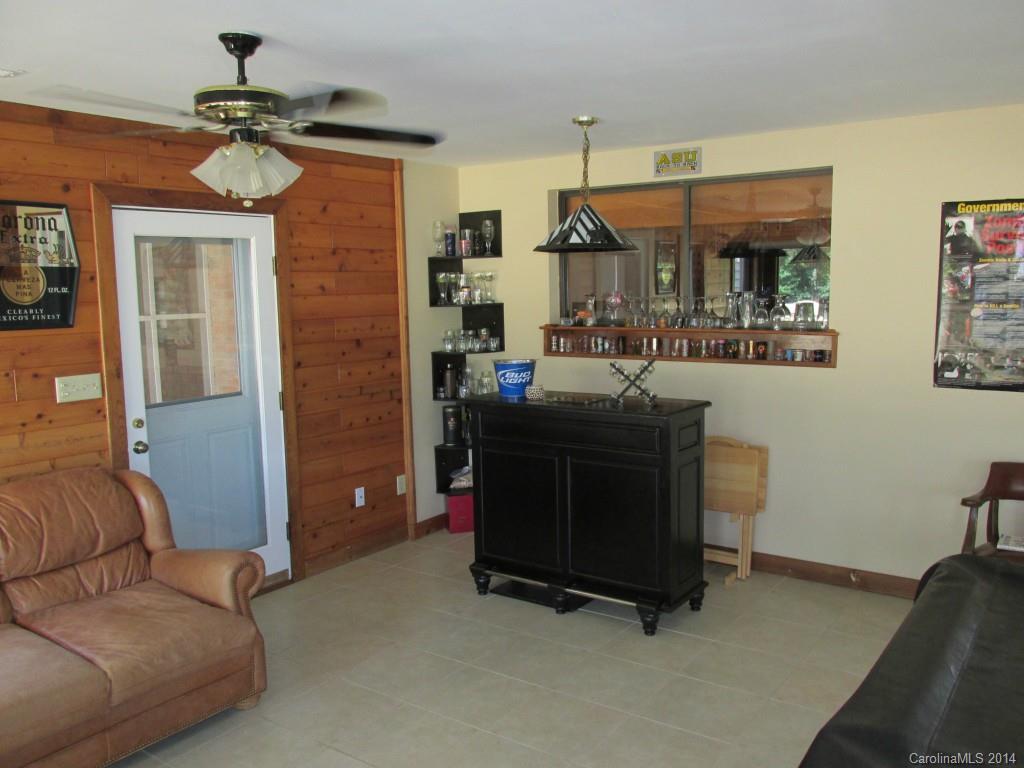 902 Tomberlin Road Monroe, NC 28110 - Photo 17 of 21 a room with furniture and a chandelier