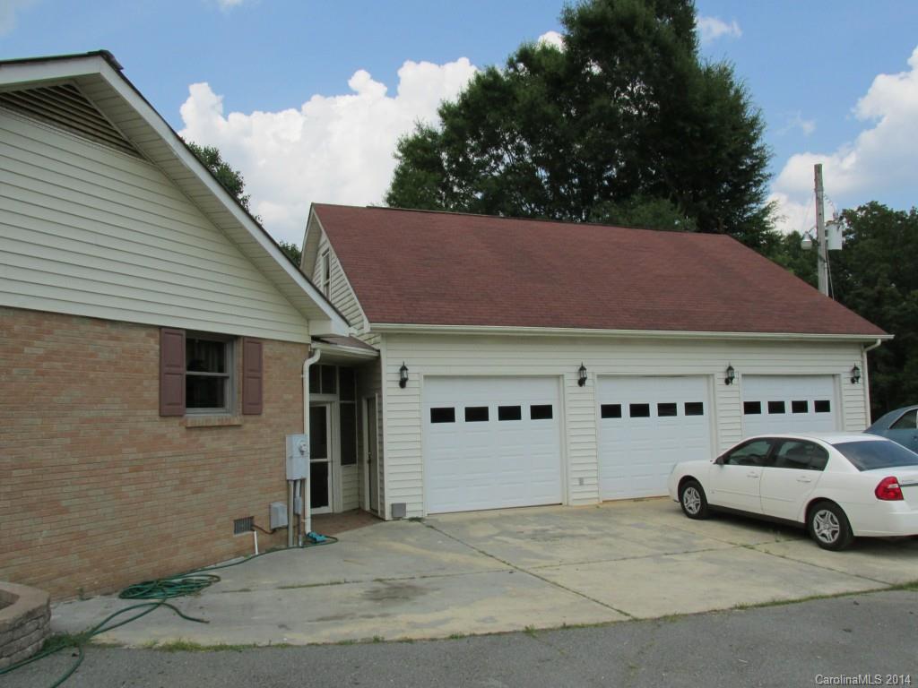 902 Tomberlin Road Monroe, NC 28110 - Photo 20 of 21 a view of a car park in front of house