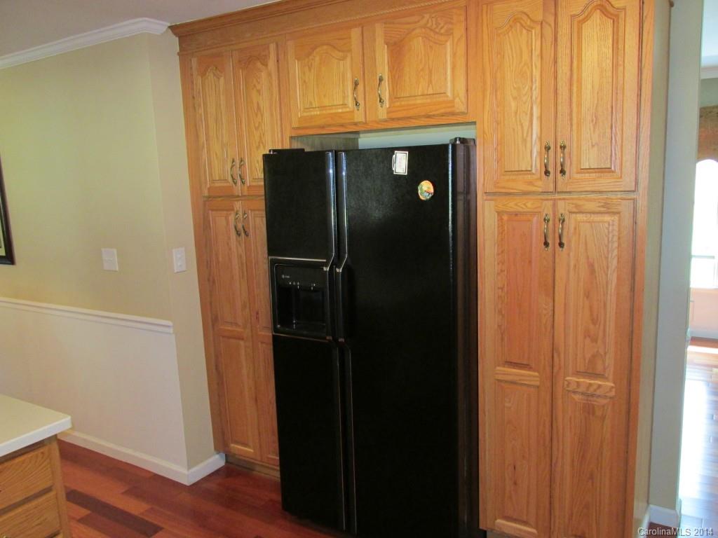 902 Tomberlin Road Monroe, NC 28110 - Photo 7 of 21 a room with wooden floor and closet