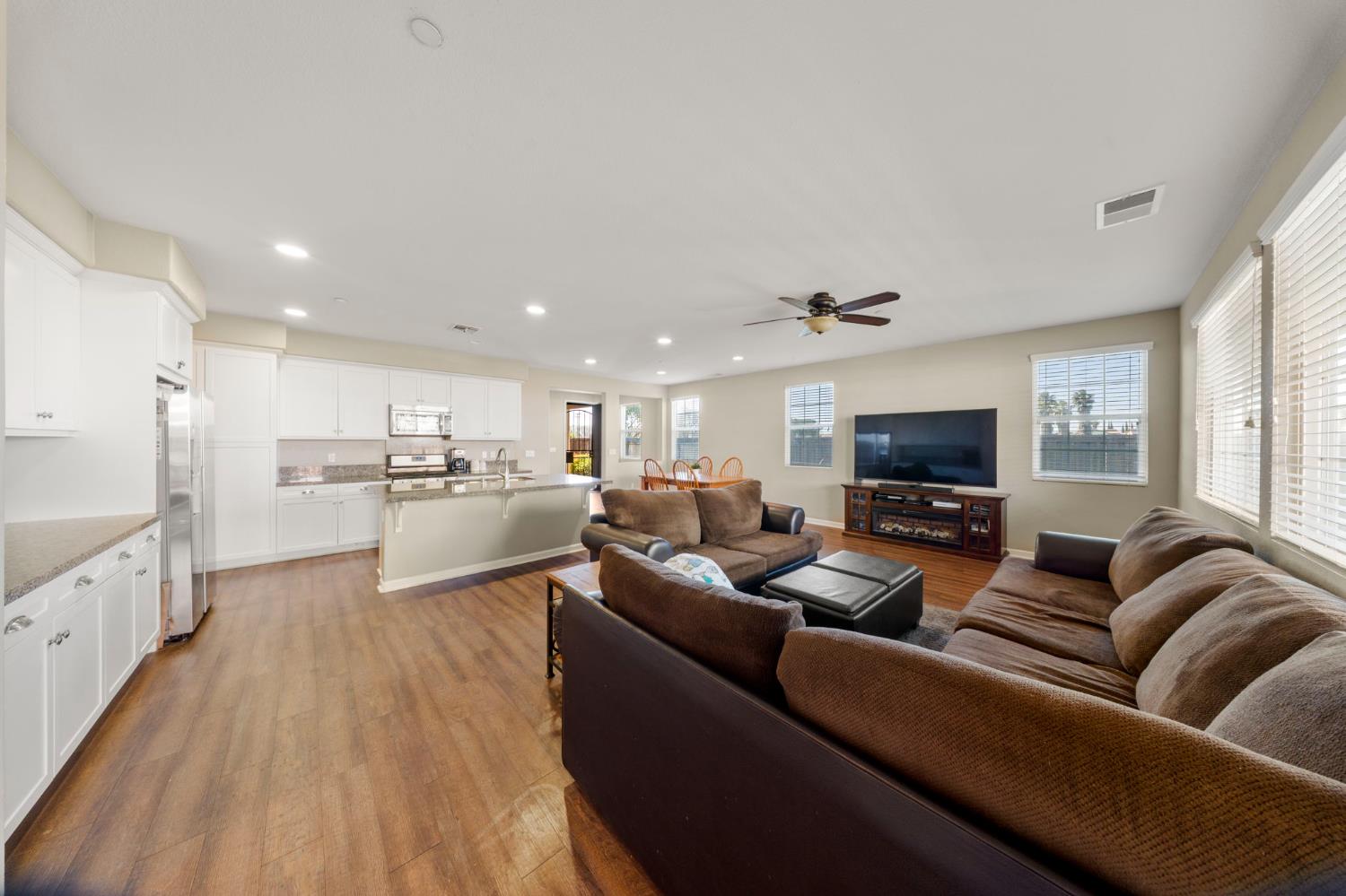 2685 Remy Javier Street Tracy, CA 95377 - Photo 12 of 26 a living room with furniture and a flat screen tv