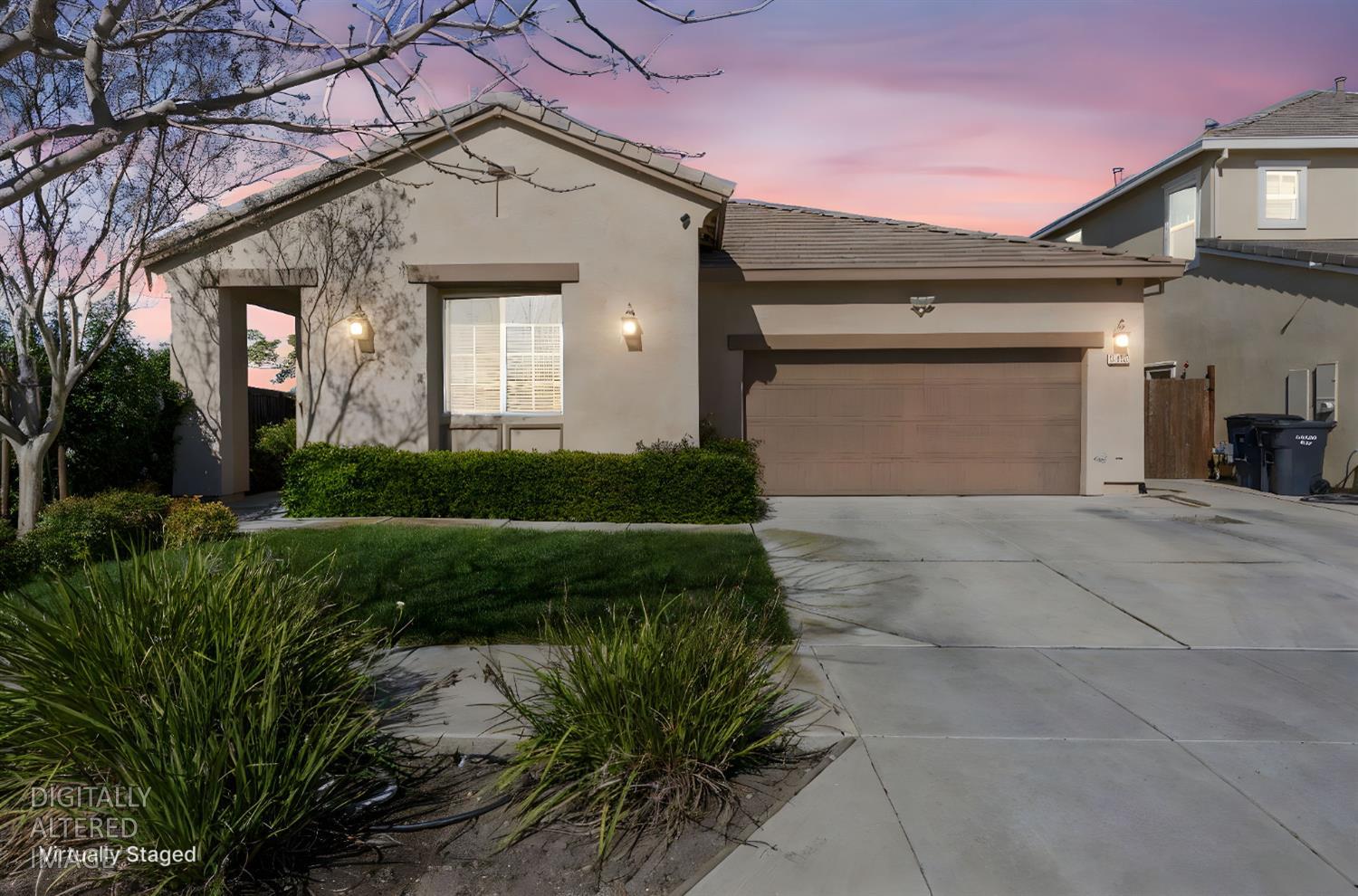 2685 Remy Javier Street Tracy, CA 95377 - Photo 2 of 26 a view of a white house next to a yard and a large tree
