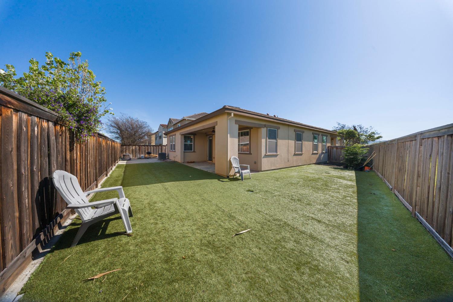 2685 Remy Javier Street Tracy, CA 95377 - Photo 23 of 26 a backyard of a house with table and chairs