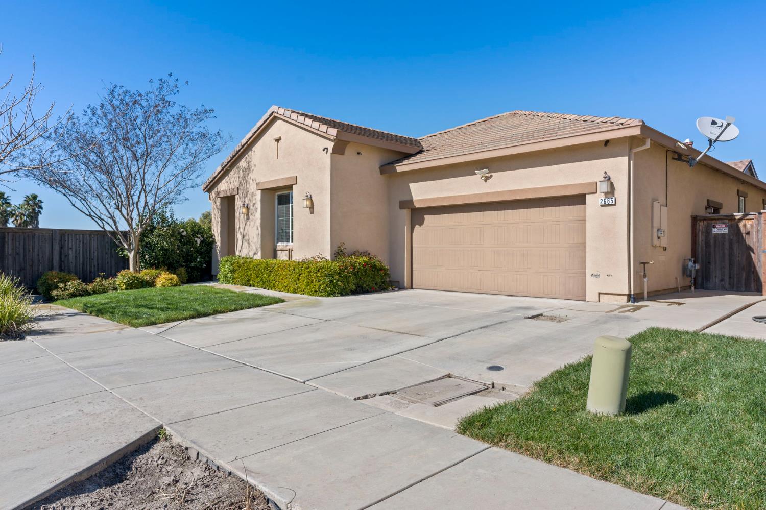 2685 Remy Javier Street Tracy, CA 95377 - Photo 4 of 26 a view of a house with a yard