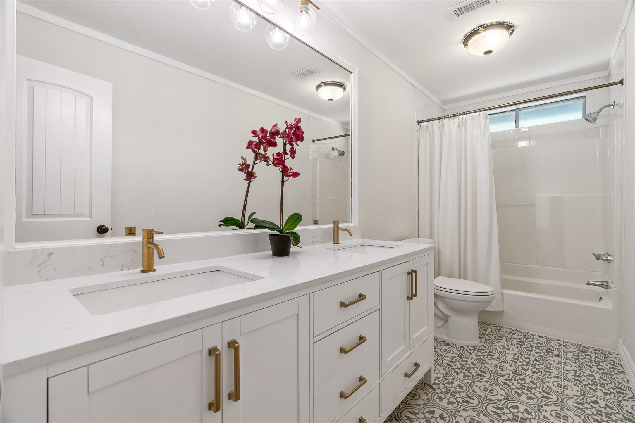 3219 Chippers Crossing Montgomery, TX 77356 - Photo 23 of 35 a bathroom with a double vanity sink toilet and shower