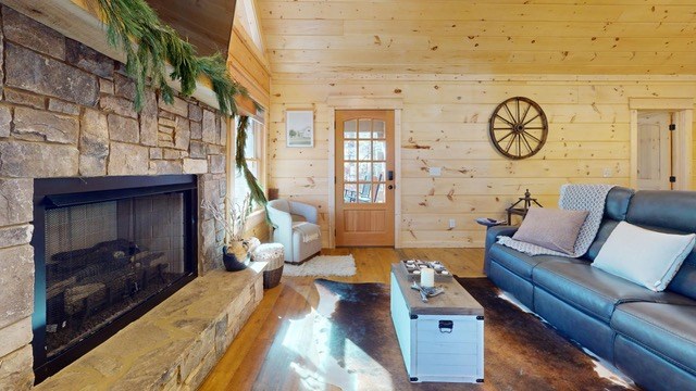 956 Lemmon Lane Ellijay, GA 30540 - Photo 13 of 60 a living room with couch and wooden floor