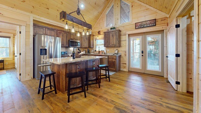 956 Lemmon Lane Ellijay, GA 30540 - Photo 17 of 60 a view of a dining room with furniture window and wooden floor