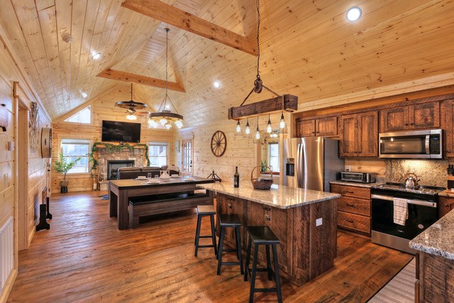 956 Lemmon Lane Ellijay, GA 30540 - Photo 20 of 60 a large kitchen with a table and chairs
