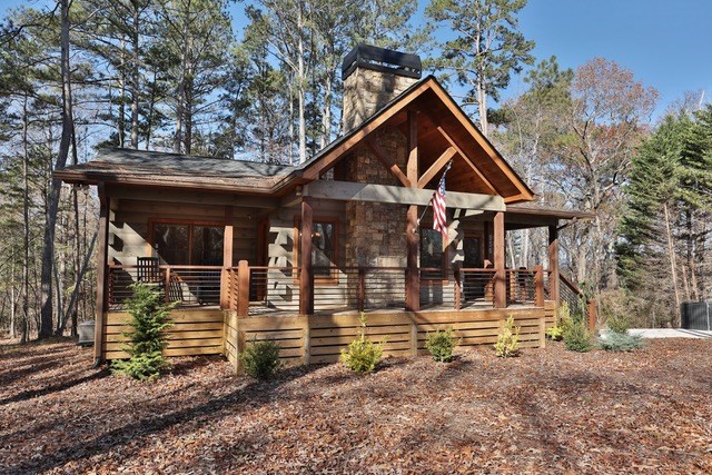 956 Lemmon Lane Ellijay, GA 30540 - Photo 2 of 60 a front view of a house with garden